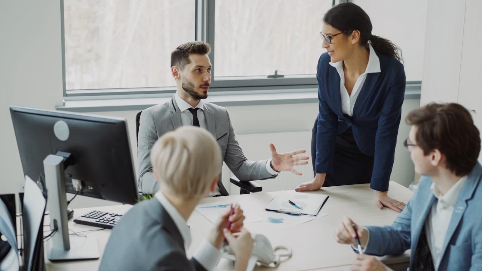 Consulting conversation around a shared desk